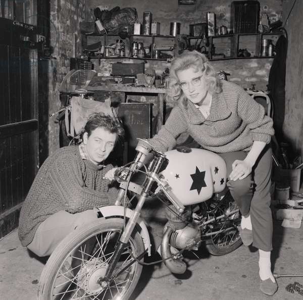 Beryl Swain, first woman to finish the Isle of Man TT race, poses with her motorbike in 1962