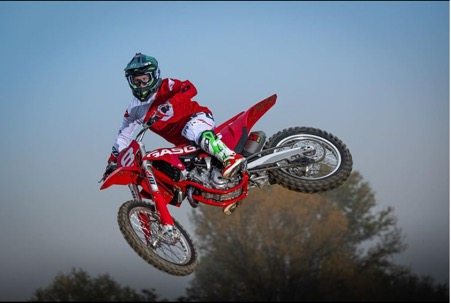 Italian motocross champion Kiara Fontanesi in mid air on her bike