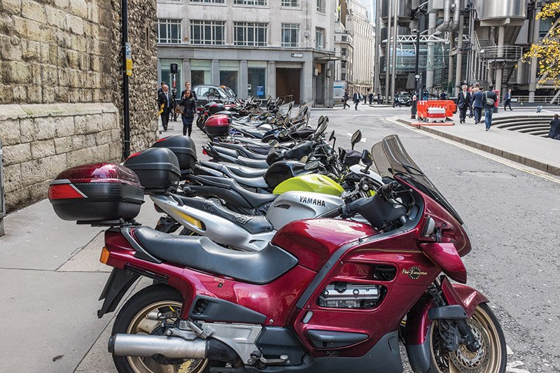 COMMUTING TO WORK PARKED BIKES